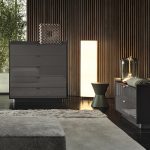 Sleek Gray Chest of Drawers with Glossy Finish and Minimalist Metal Handles