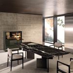 Luxury Black Marble Oval Dining Table with Sleek Geometric Base