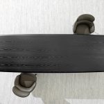 Luxury Black Marble Oval Dining Table with Sleek Geometric Base