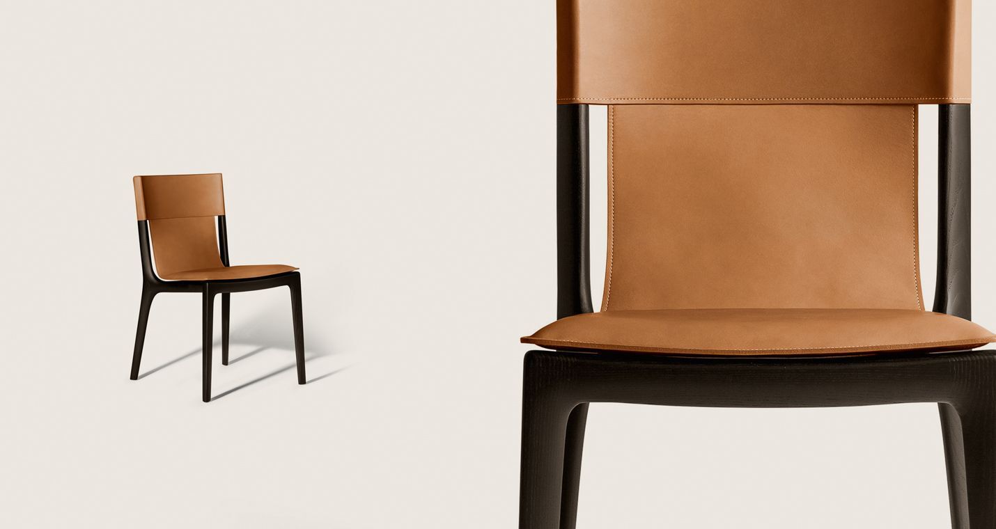 Tan Leather Dining Chair with Dark Wood Frame and Sleek Curved Design